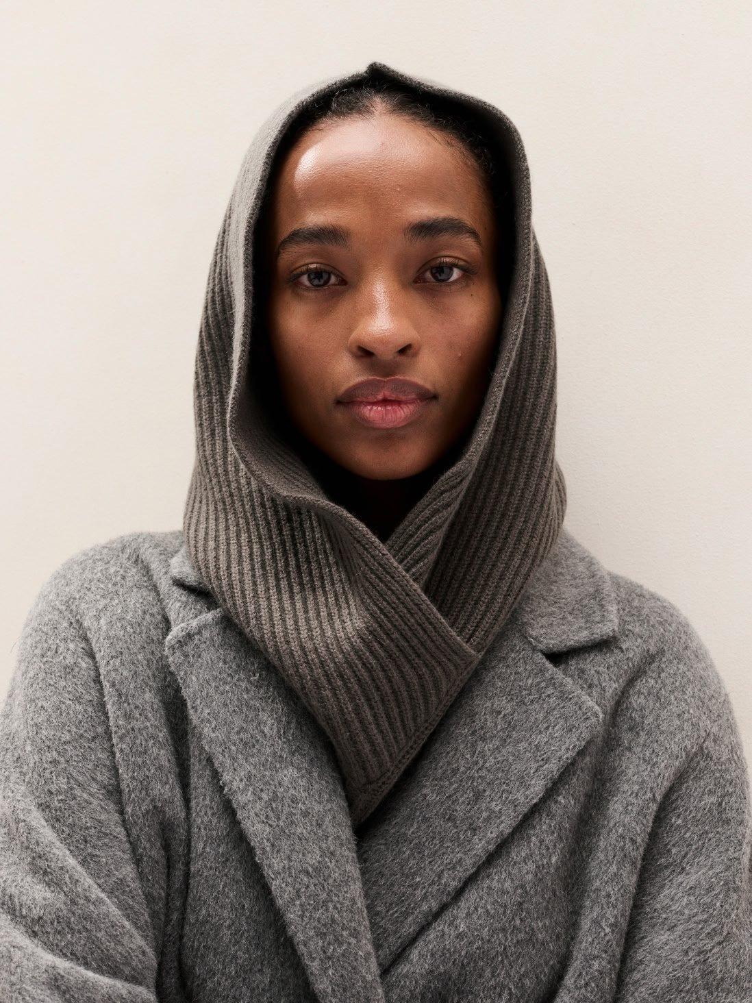 woman in a hood and coat